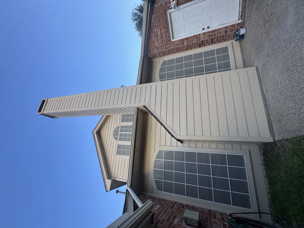 Finished rebuilt chimney chase on a North Texas home after restoration by Texan Flue