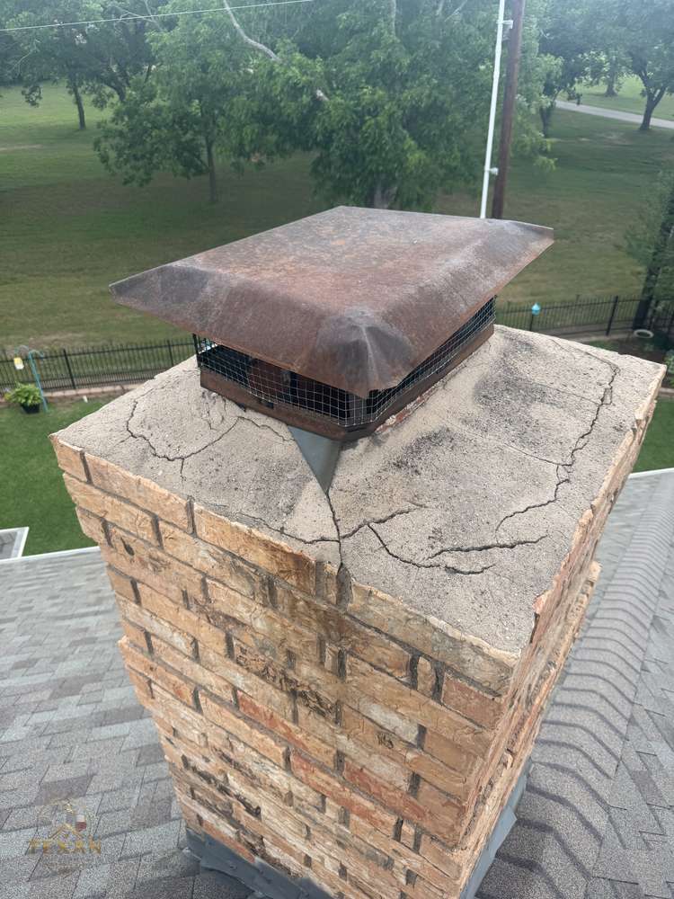 Before — cracked crown and rusted cap — Texan Flue, Dallas–Fort Worth