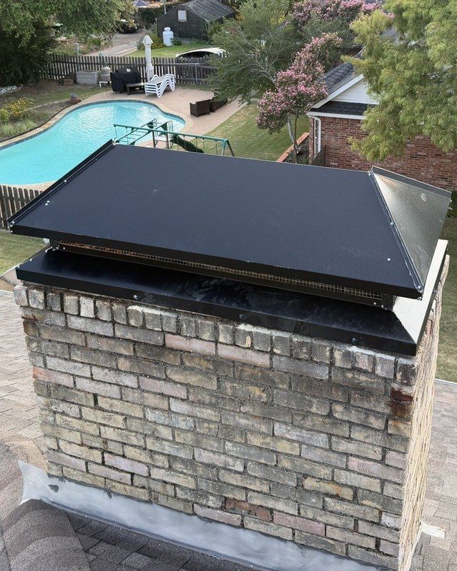 Chase cover installed by Texan Flue on a Dallas rooftop at golden hour