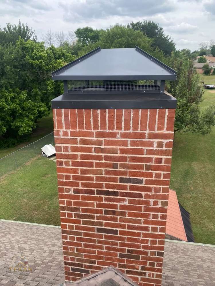 New chimney cap on red brick — Texan Flue, Dallas–Fort Worth
