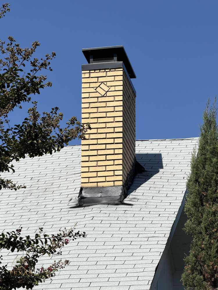 Powder-coated cap under a Texas sky — Texan Flue, Dallas–Fort Worth